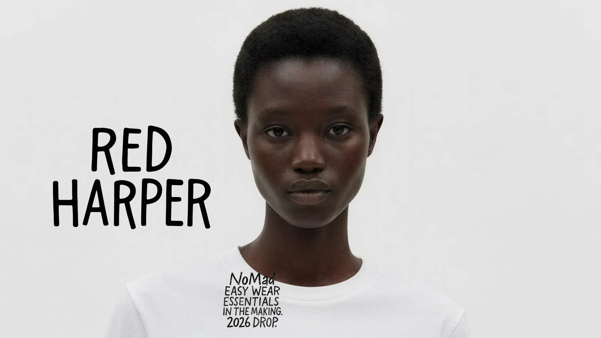Model wearing a white t-shirt with text, standing against a plain background with 'Red Harper' branding.